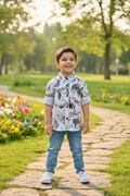 Boy 3-4 years in tropical floral shirt