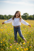 Girl wearing grey denim jeans - meadow setting