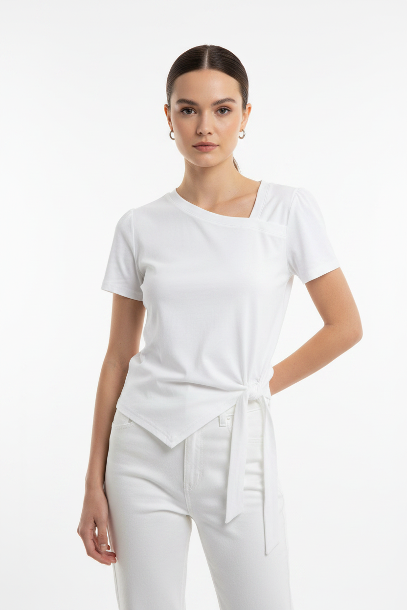 Model wearing Asymmetric Tie-Hem Top in White