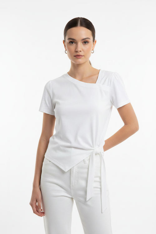 Model wearing Asymmetric Tie-Hem Top in White