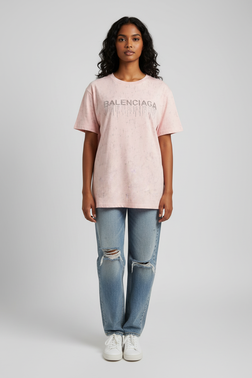 Indian model wearing pink rhinestone drip graphic tee