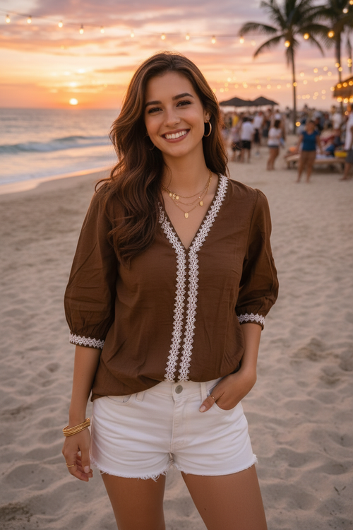 Indian model wearing brown boho lace trim top at beach sunset