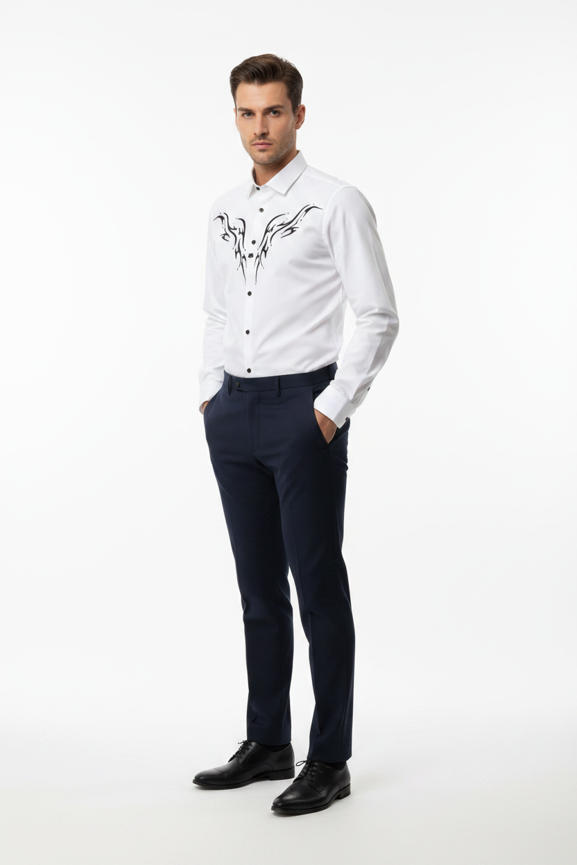 Male model wearing white abstract pattern shirt tucked into dark trousers