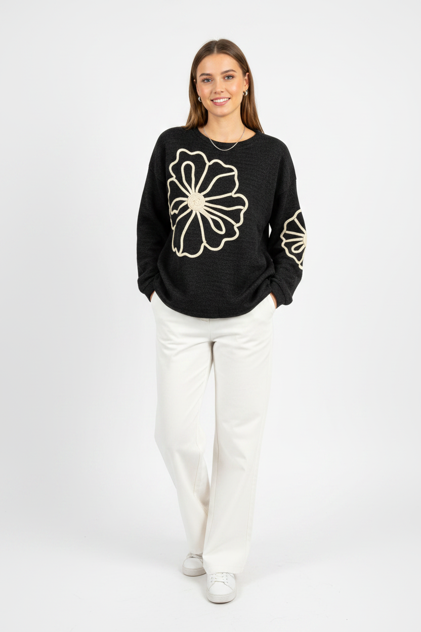 Kiwi model wearing Floral Embroidered Knit Sweater in Black – studio