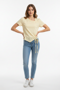 Model wearing Asymmetric Tie-Hem Top in White