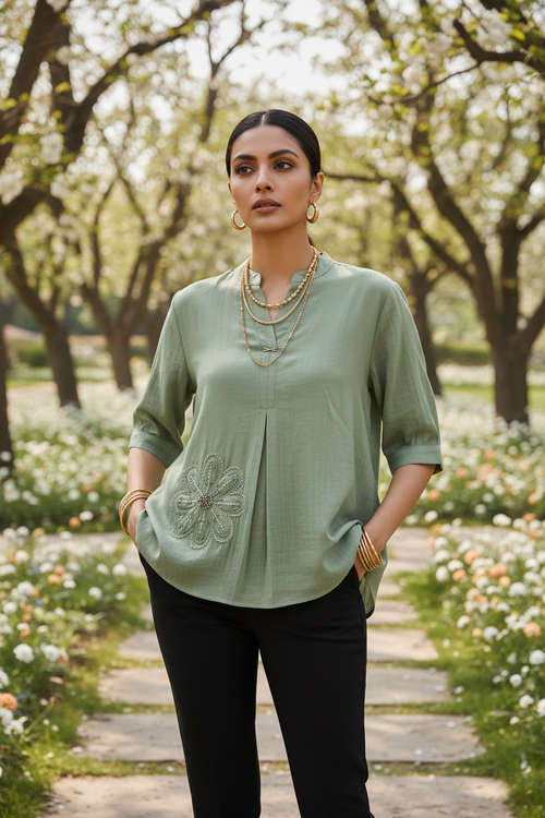 Indian model wearing sage green mandarin collar beaded top