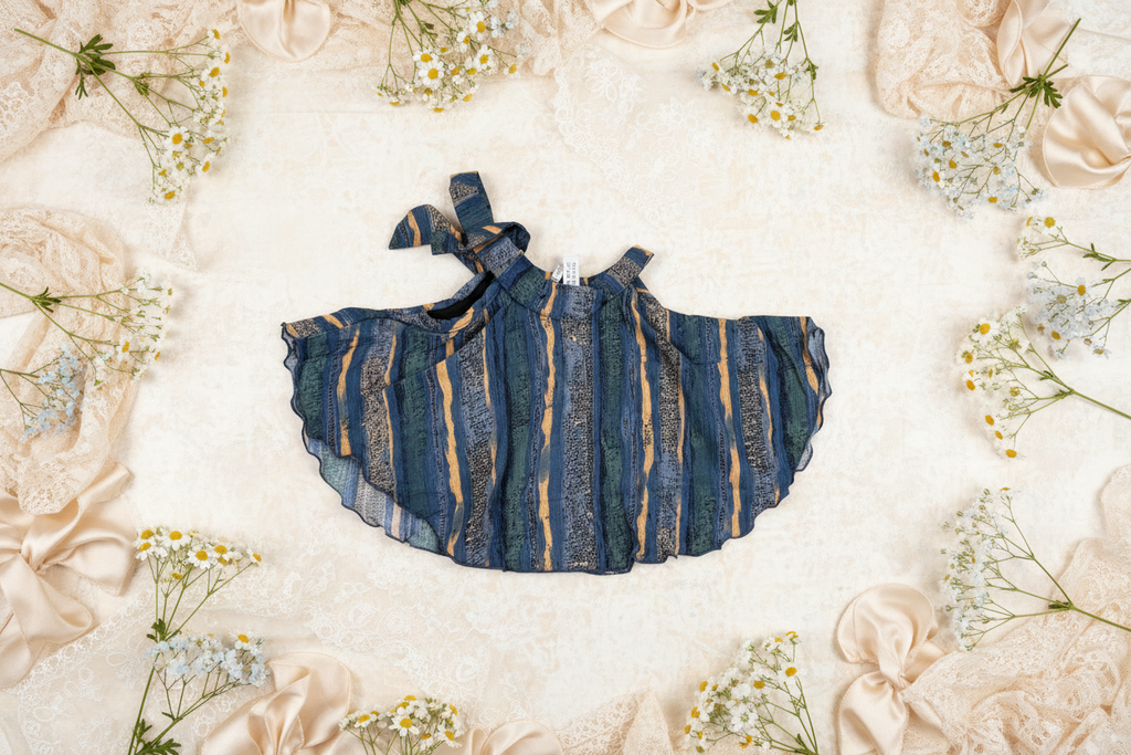 Striped top on cream background with flowers